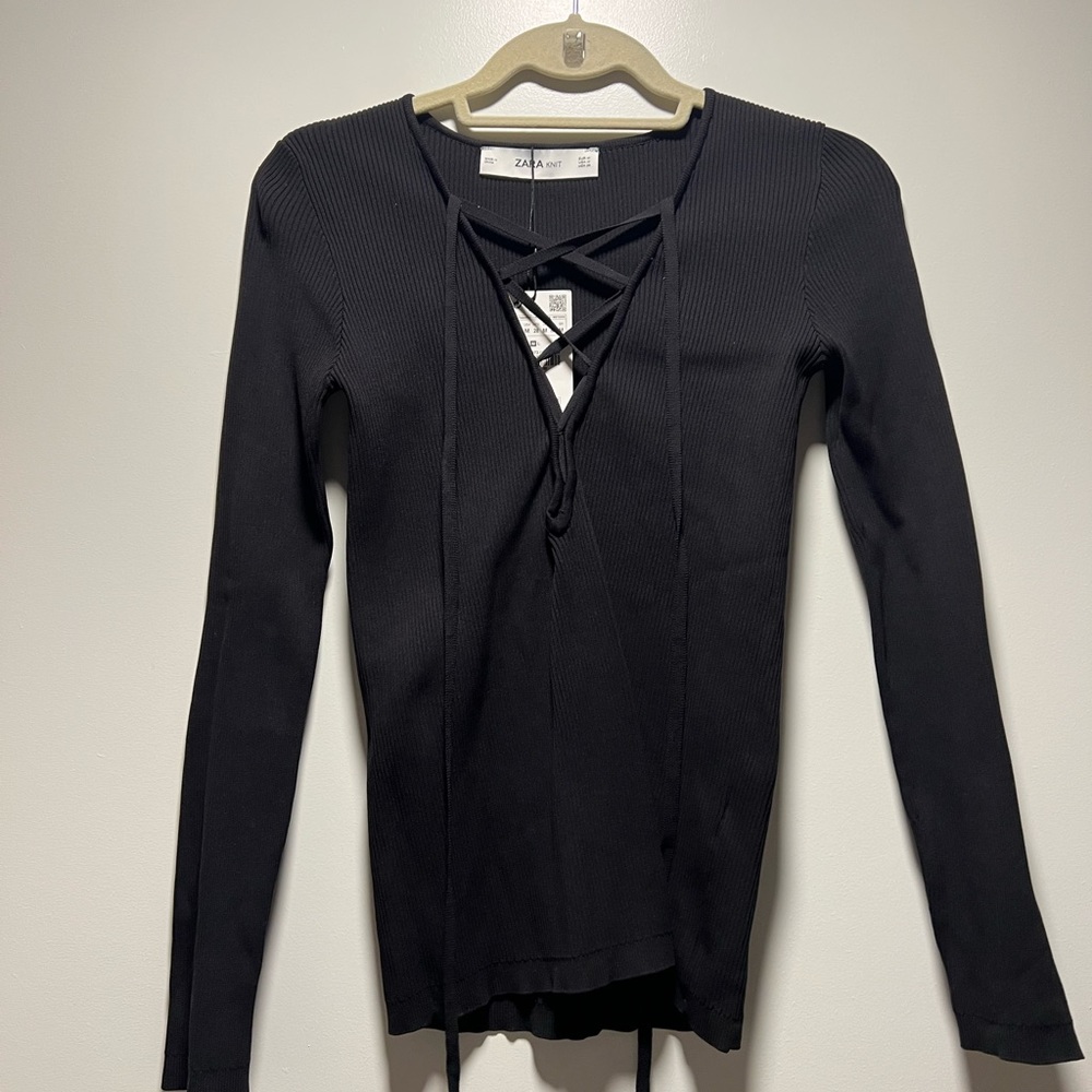 Zara black knit long sleeve shirt with deep v neck. Brand new with tags on!